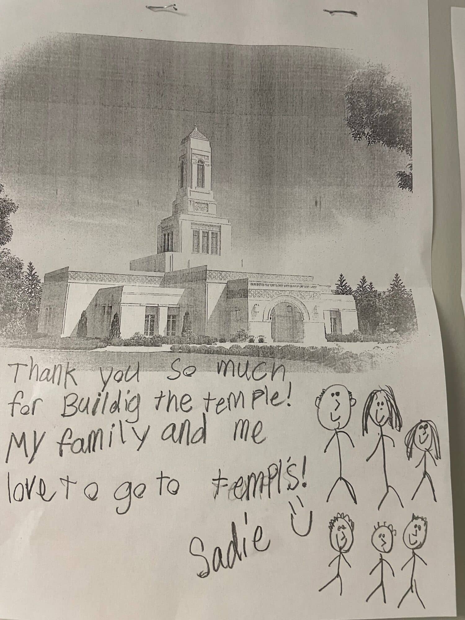 An image of the temple rendering on paper with the words "Thank you so much for building the temple! My family and me love to go to temples! Sadie."
