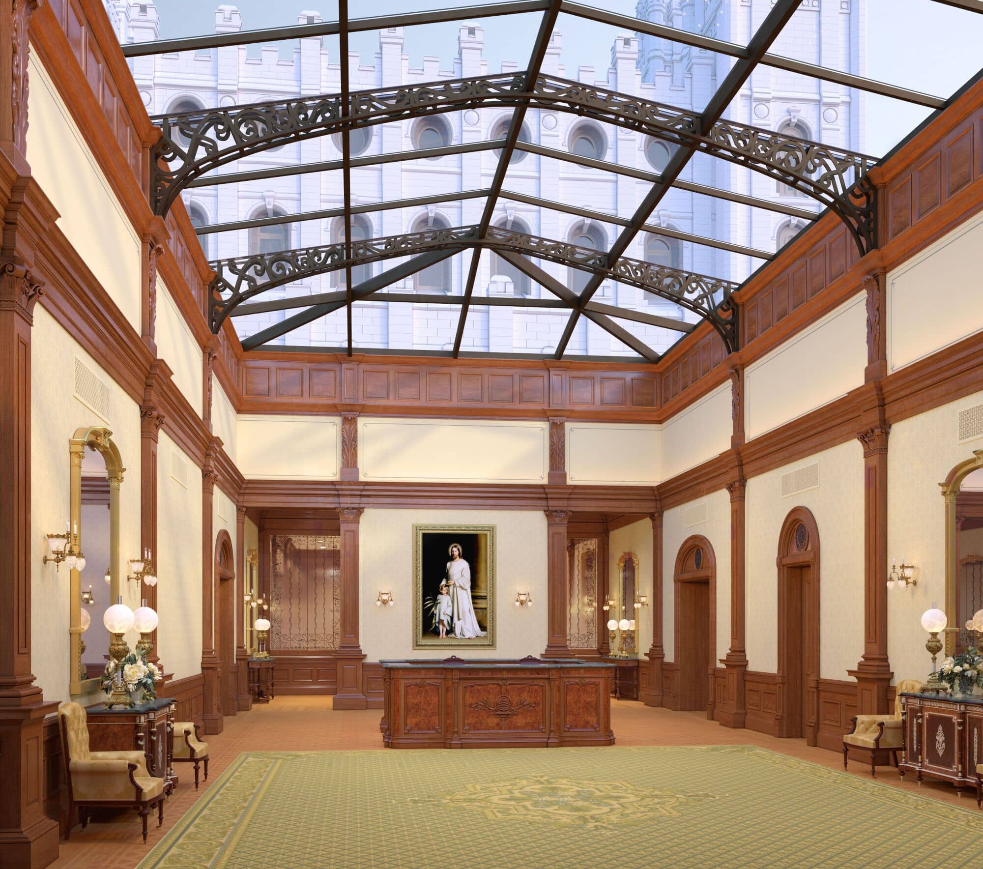 A large room with a wooden desk in the center, a painting of Christ behind it and a large skylight above it.