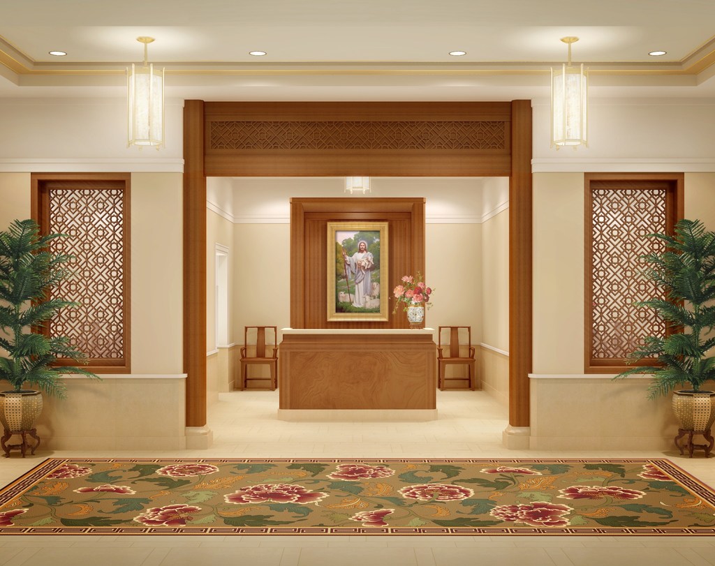A rendering of a desk, floral rug and painting of Christ inside the Hong Kong temple.