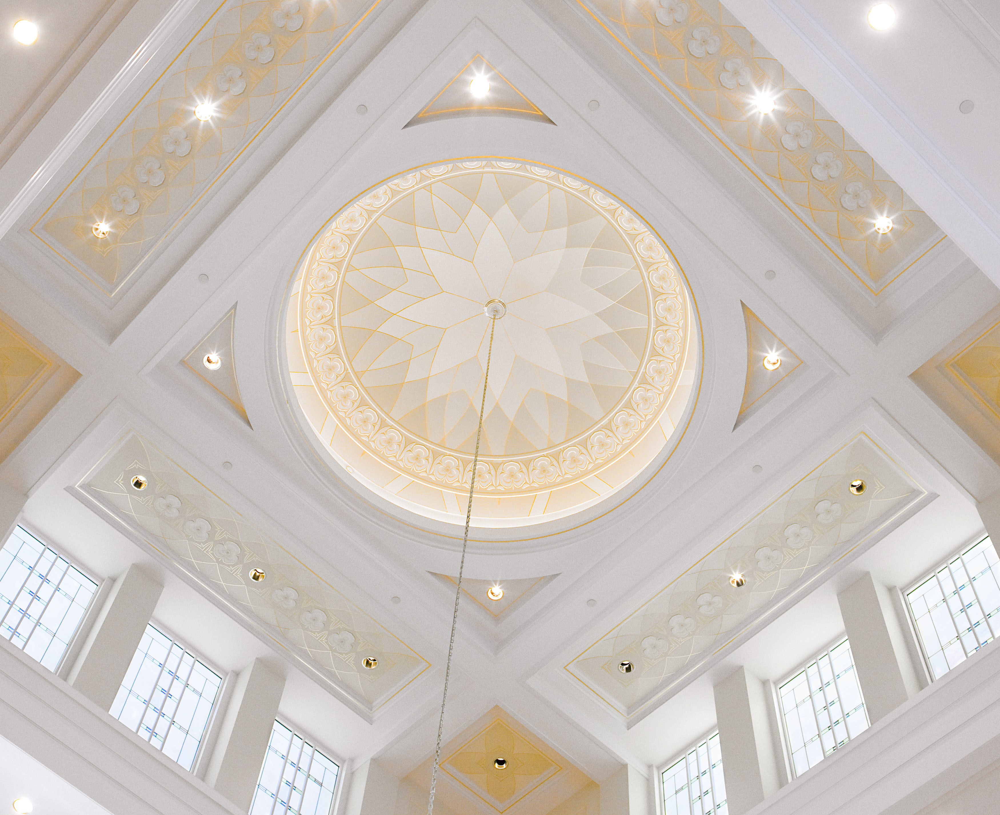 A large white room with a golden-colored dome on the ceiling and a glass chandelier hanging from it.