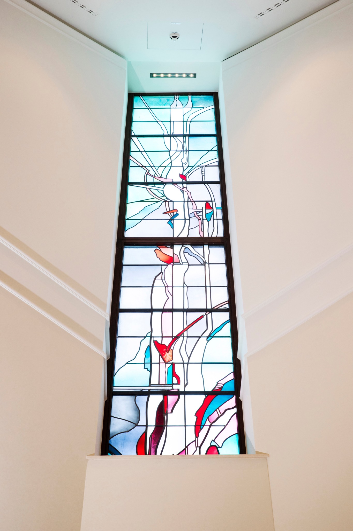 A rectangular stained-glass window.