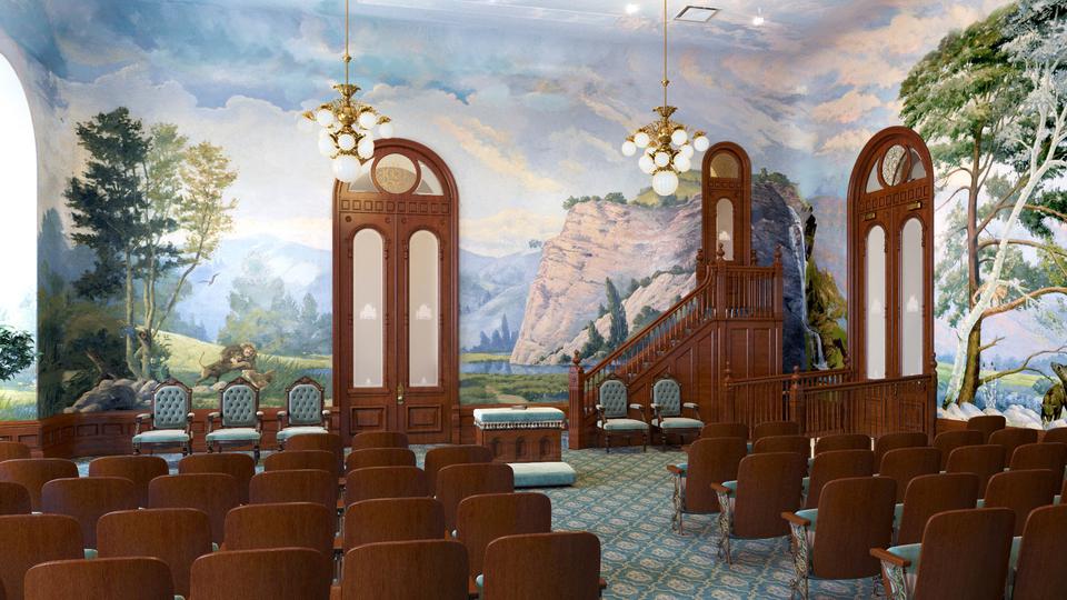 A room filled with chairs, with a mural of trees, mountains and clouds all around the walls.